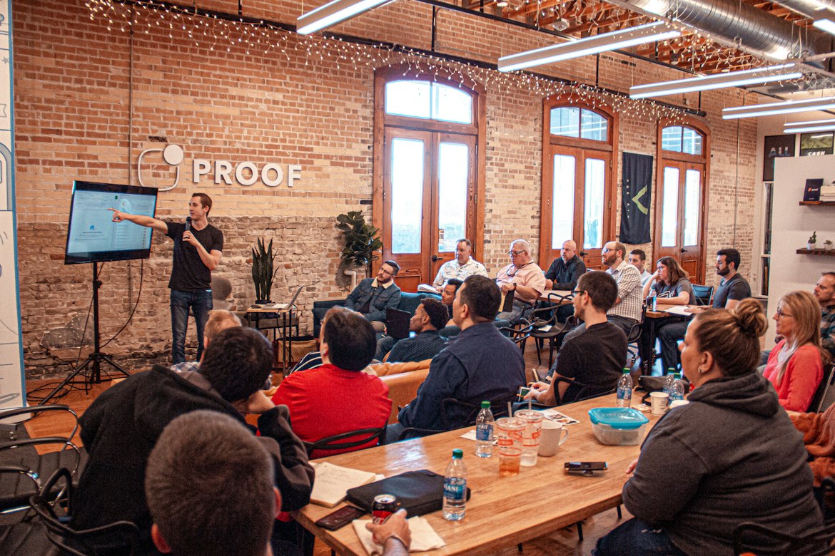 Audience engaging at a live presentation and builder demo